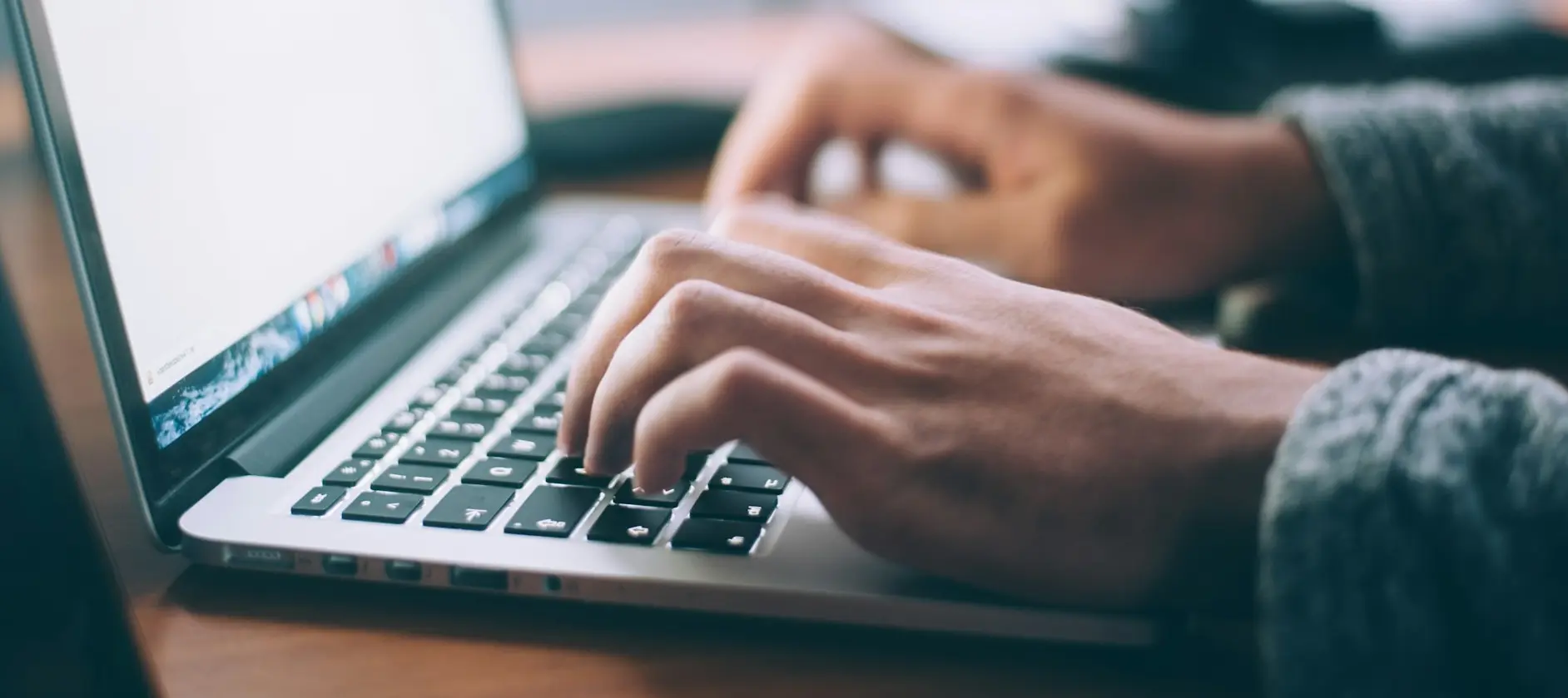 person using MacBook Pro